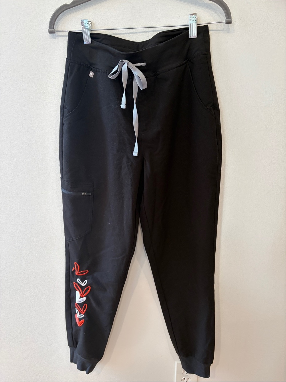 Figs Zamora Black Joggers with Orange and White Embroidered Heart Accents Small